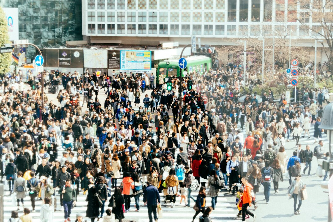 diverse people in city crowd
