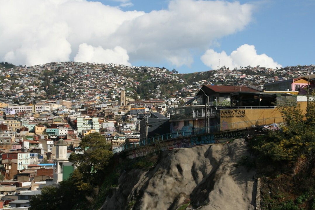 Street in Valparaiso, Chile with colorful houses